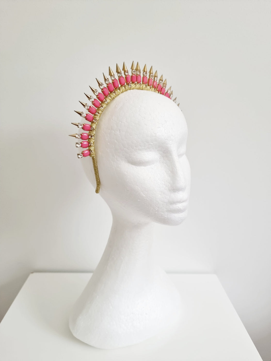 pink and gold metal rivit headband side front view