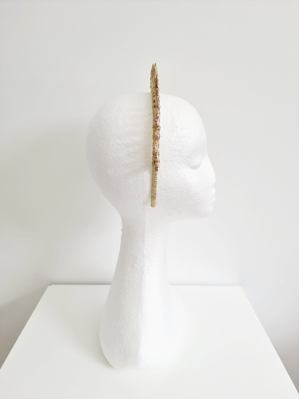 pink and gold metal rivit headband side view