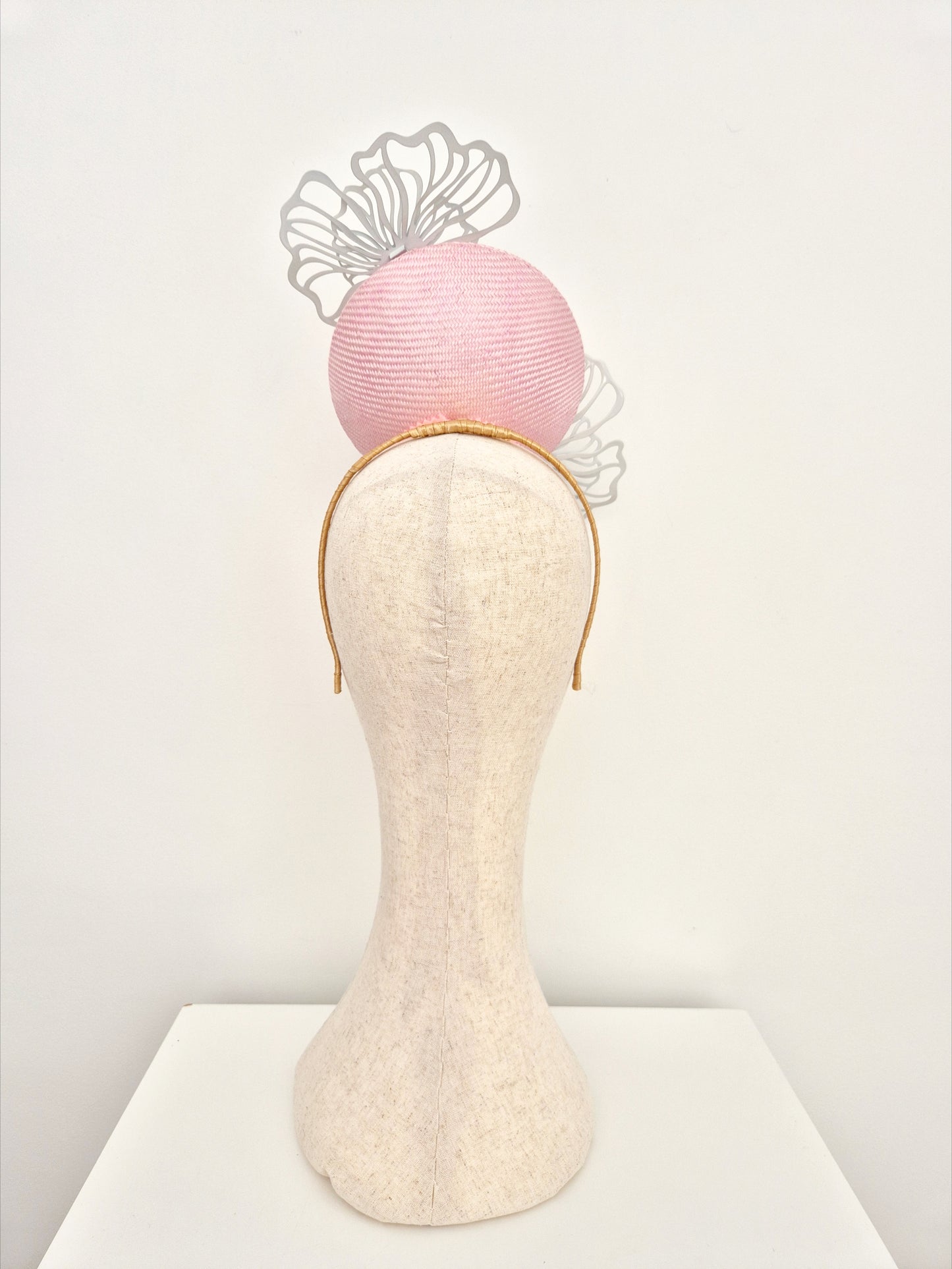 Miss Peyton. Womens Pale Pink button percher headpiece with white flowers