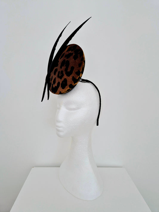animal print percher with feathers side front
