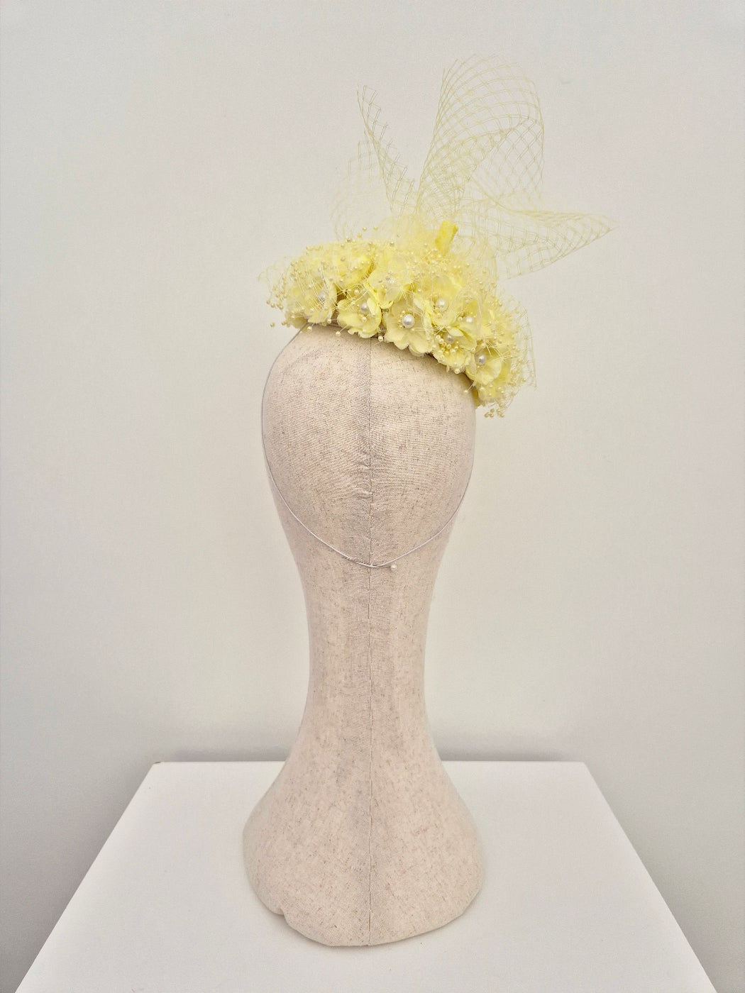 back view 3d floral headpiece in pale yellow