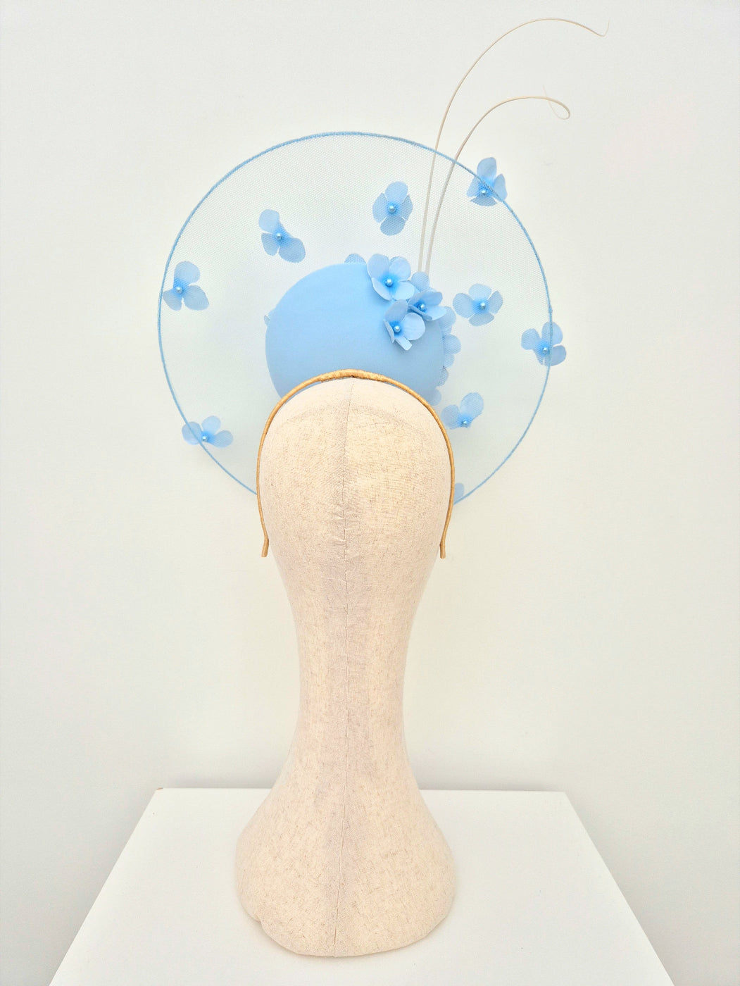 back view light blue floral percher headpiece