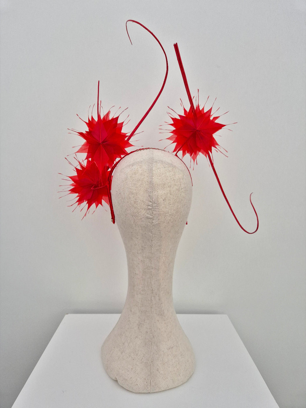 back view red feather flower headpiece with floating quills