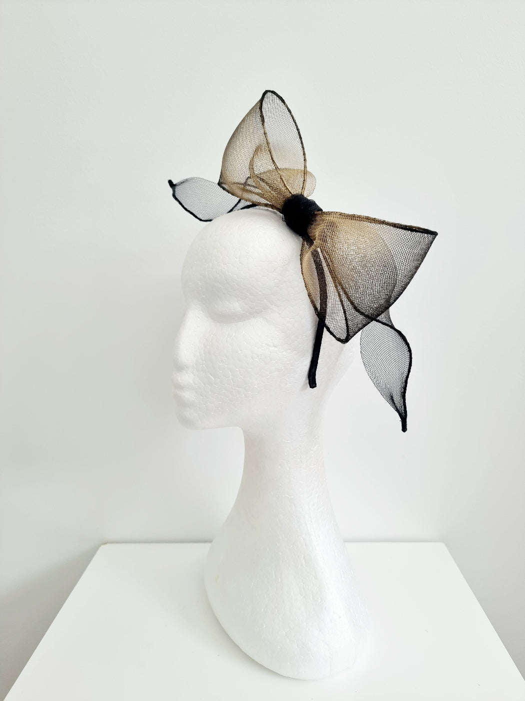 black and gold bow headband side view