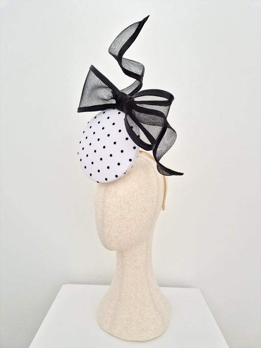 black and white polka dot headpiece with bow side view