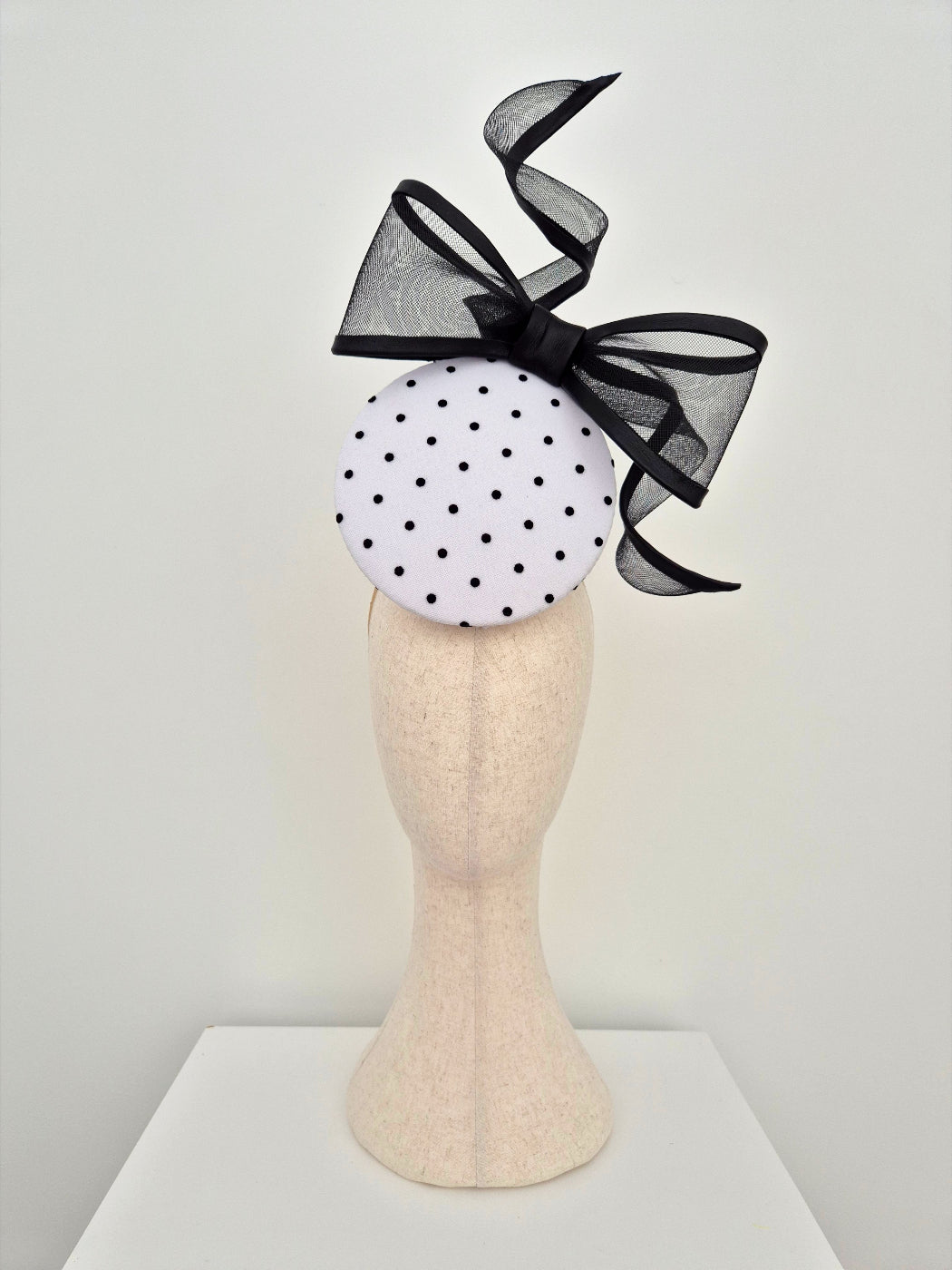 black and white polka dot percher headpiece with bow