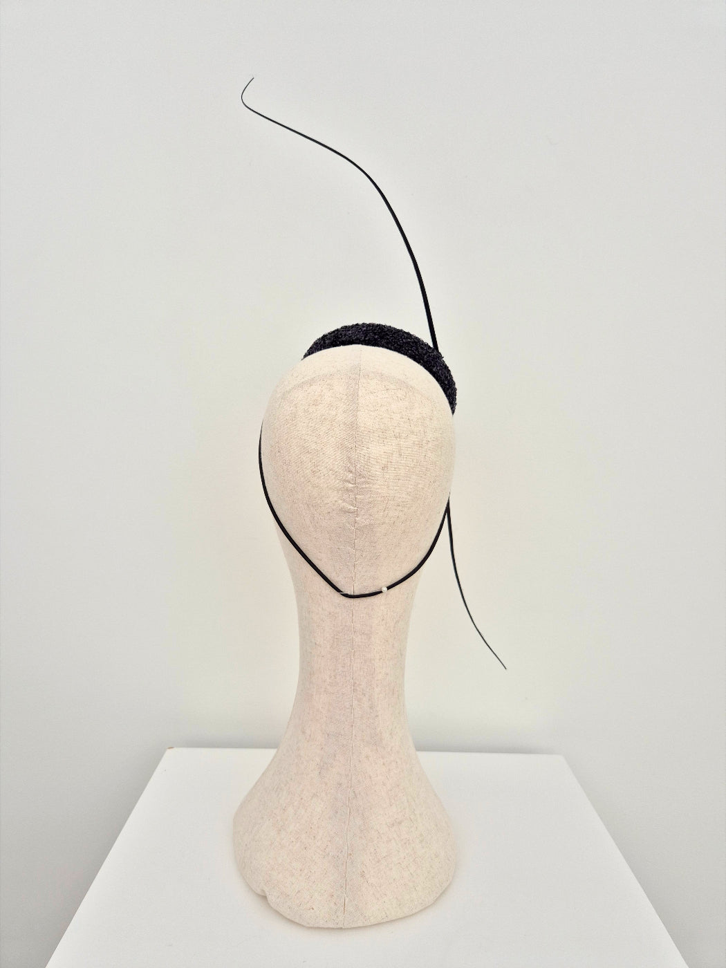 black button headpiece with quills