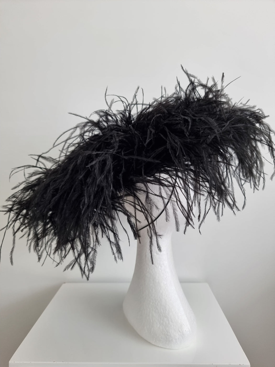 black ostrich feather hat side back
