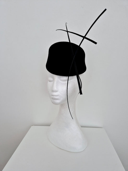 black wool felt headpiece with quills side view