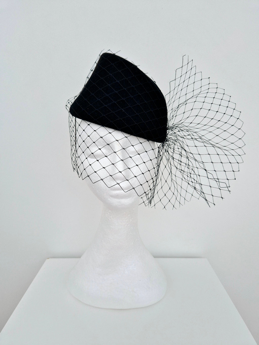 black wool felt headpiece with veiling