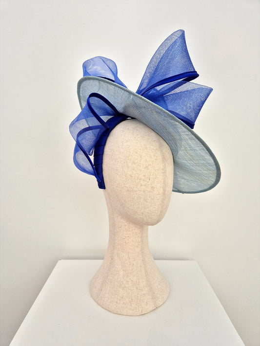 blue straw hat with bow side view
