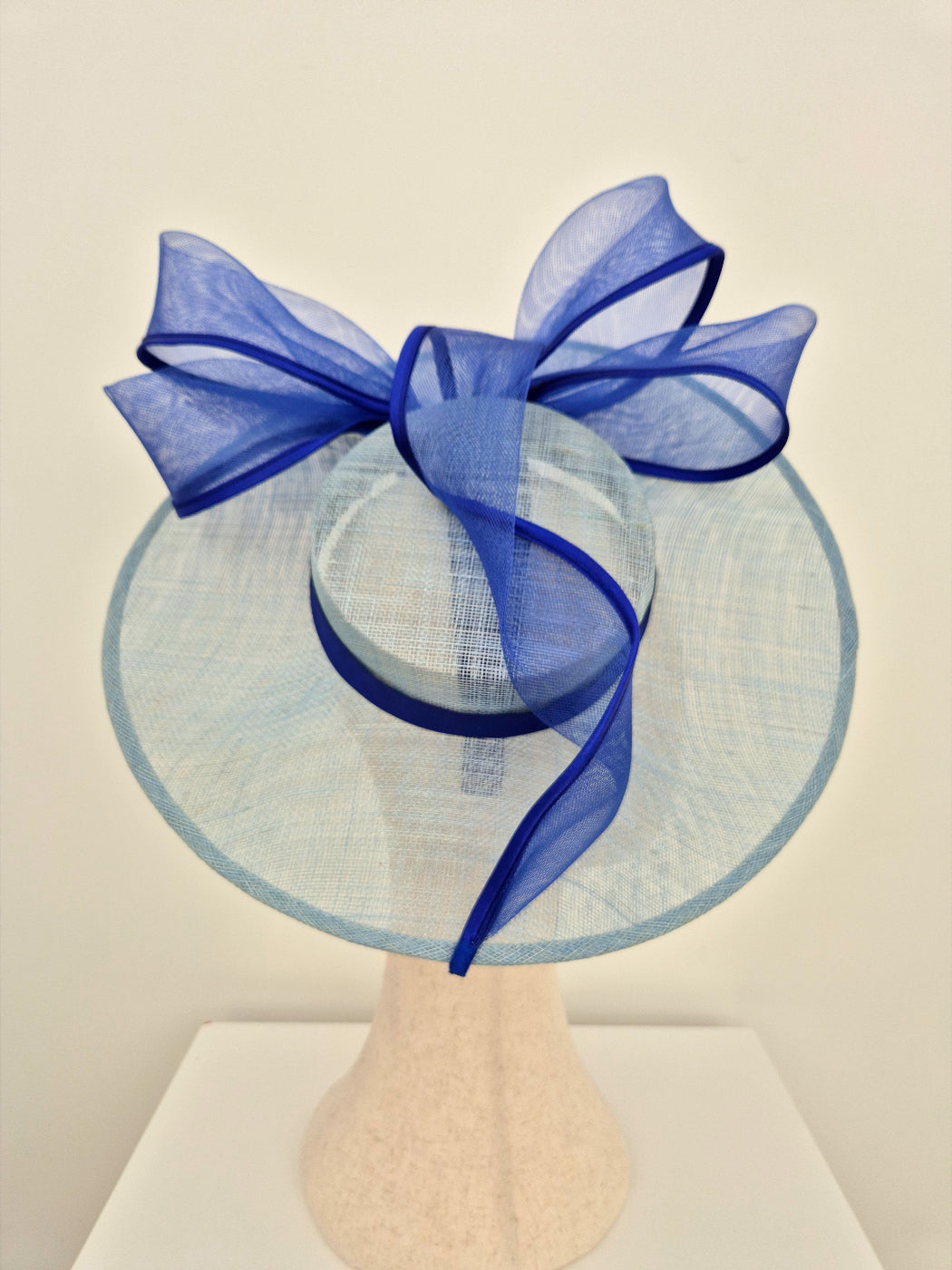 blue straw hat with bow top view