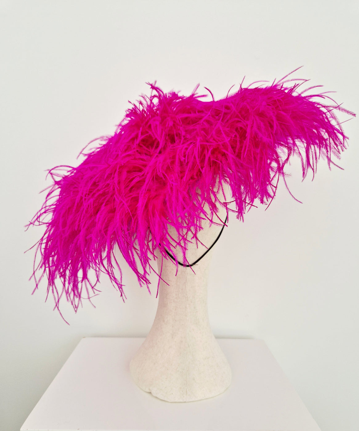bright pink feather hat back view