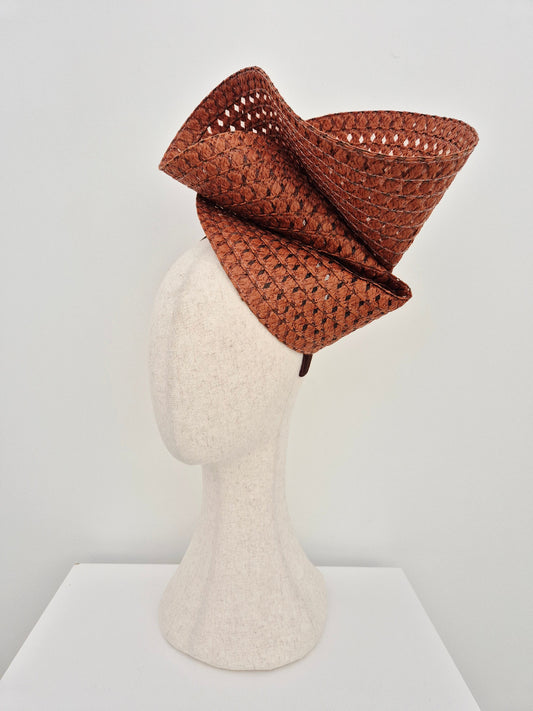 brown straw headpiece side view