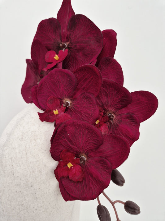 close up burgundy floral headpiece
