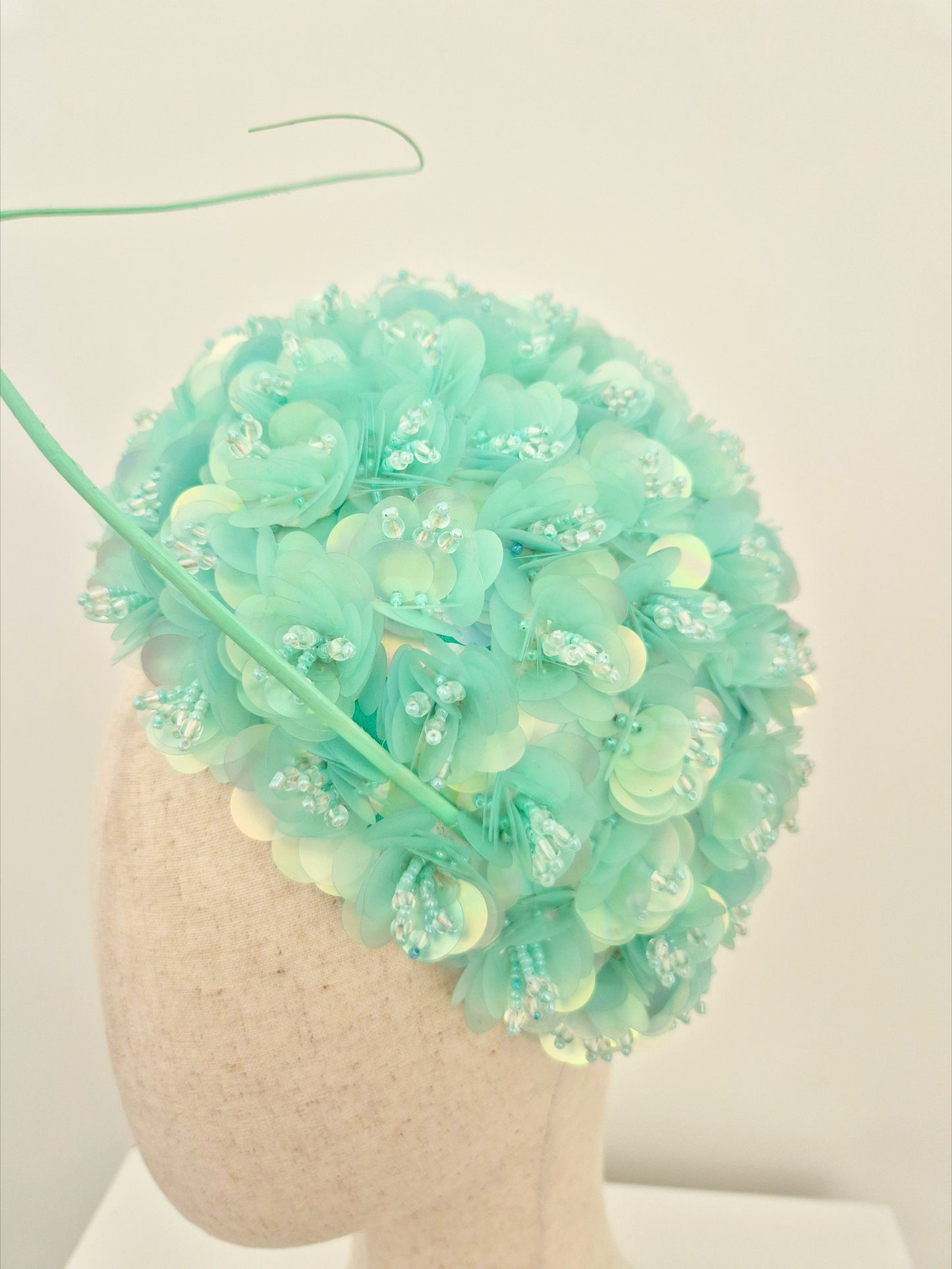 close up mint green 3d floral headpiece