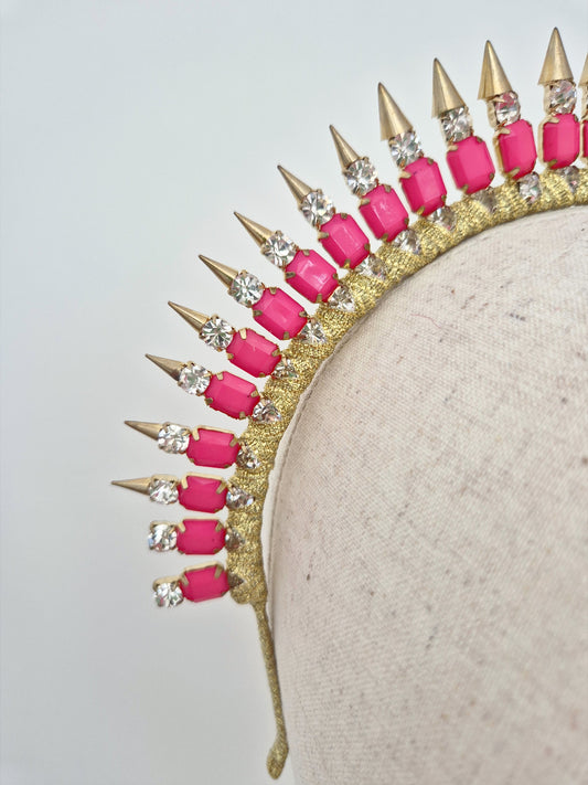 close up hot pink and gold crown
