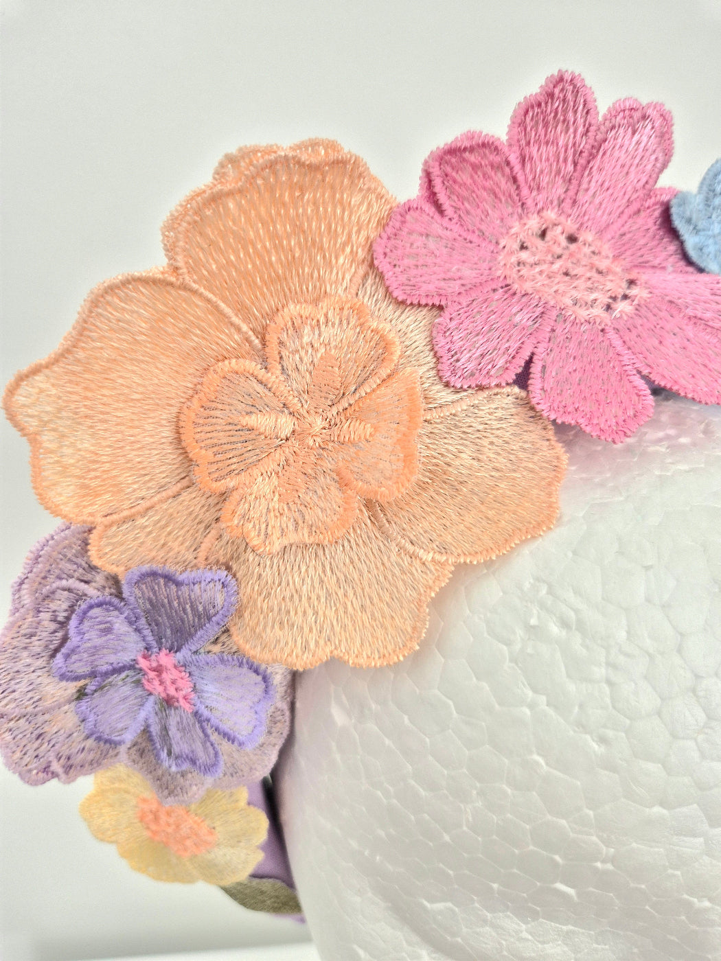 close up of lilac pastel multi lace headband