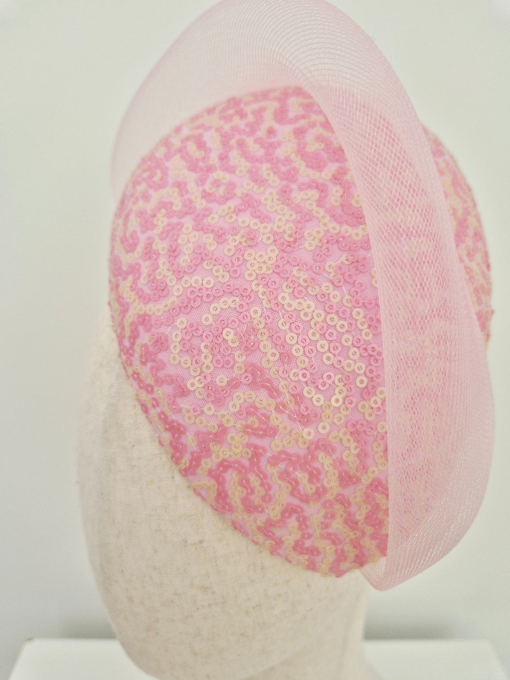 close up pink and cream sequin headpiece