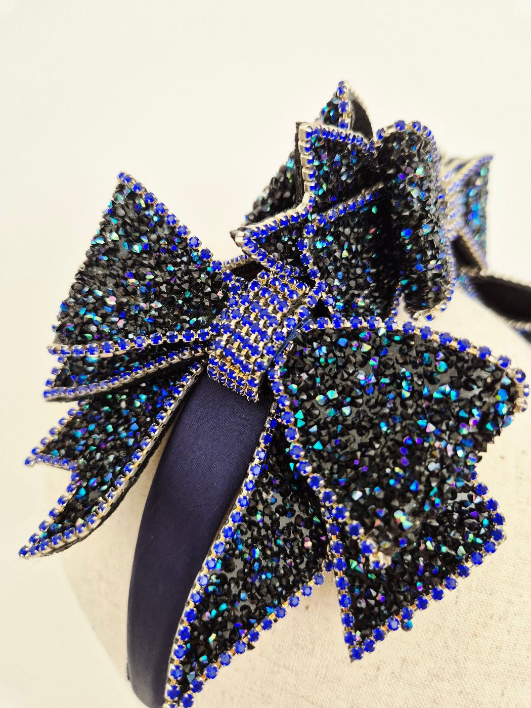 dark blue rhinestone bow headpiece close up