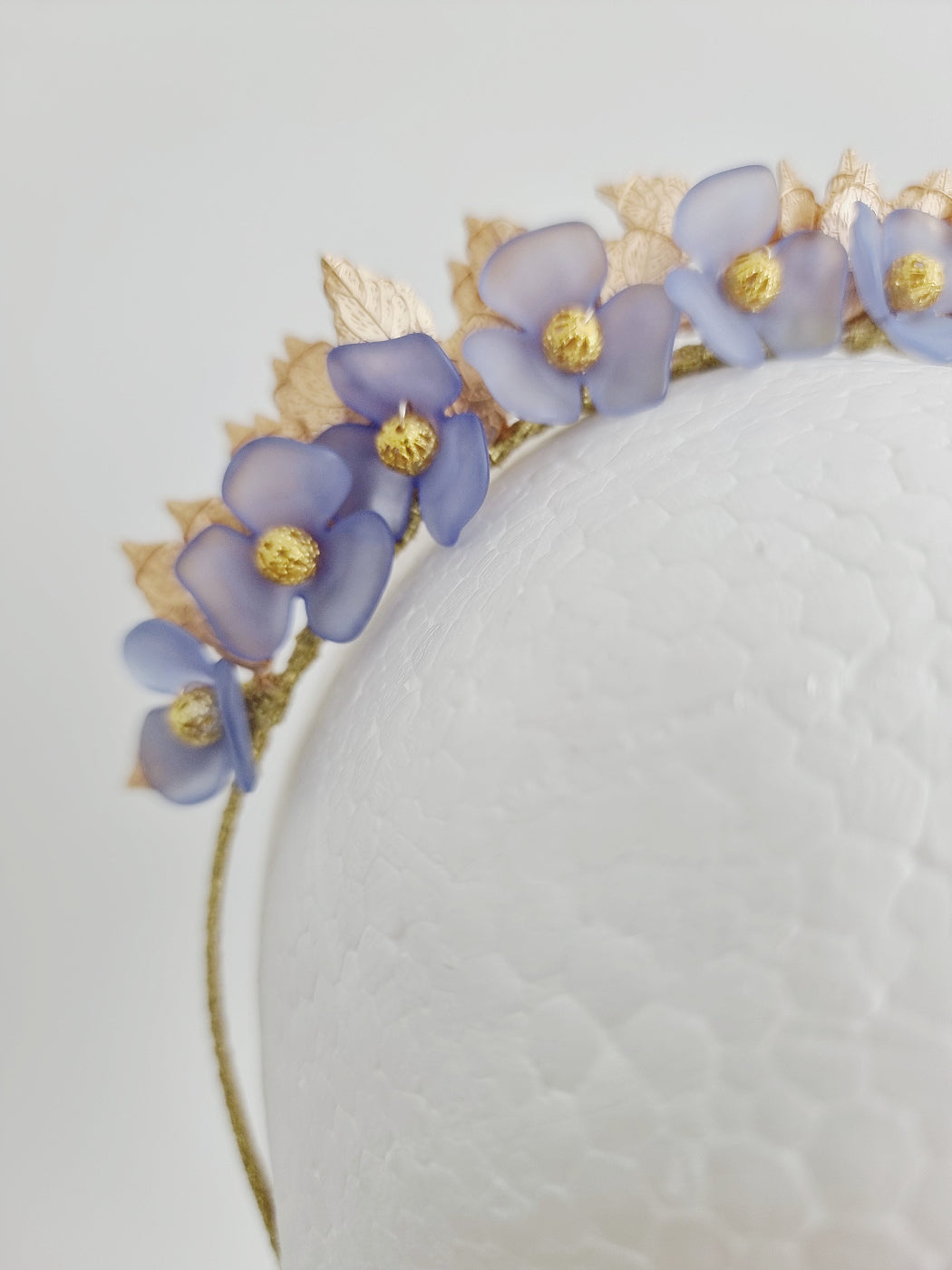 dusty blue floral headpiece close up