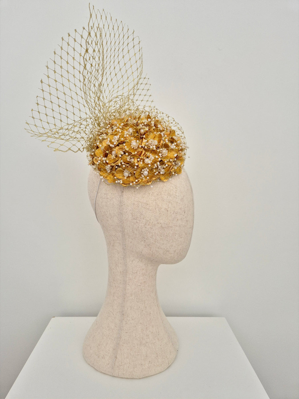 gold 3d flower headpiece with veiling side fornt