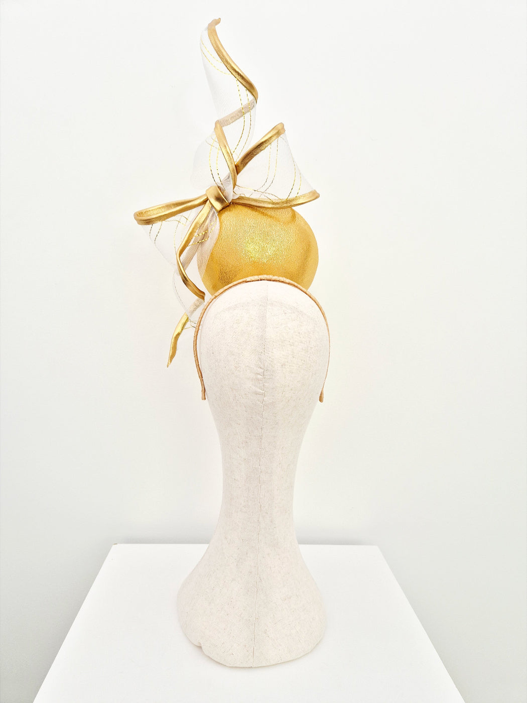 gold percher headpiece with bow back view