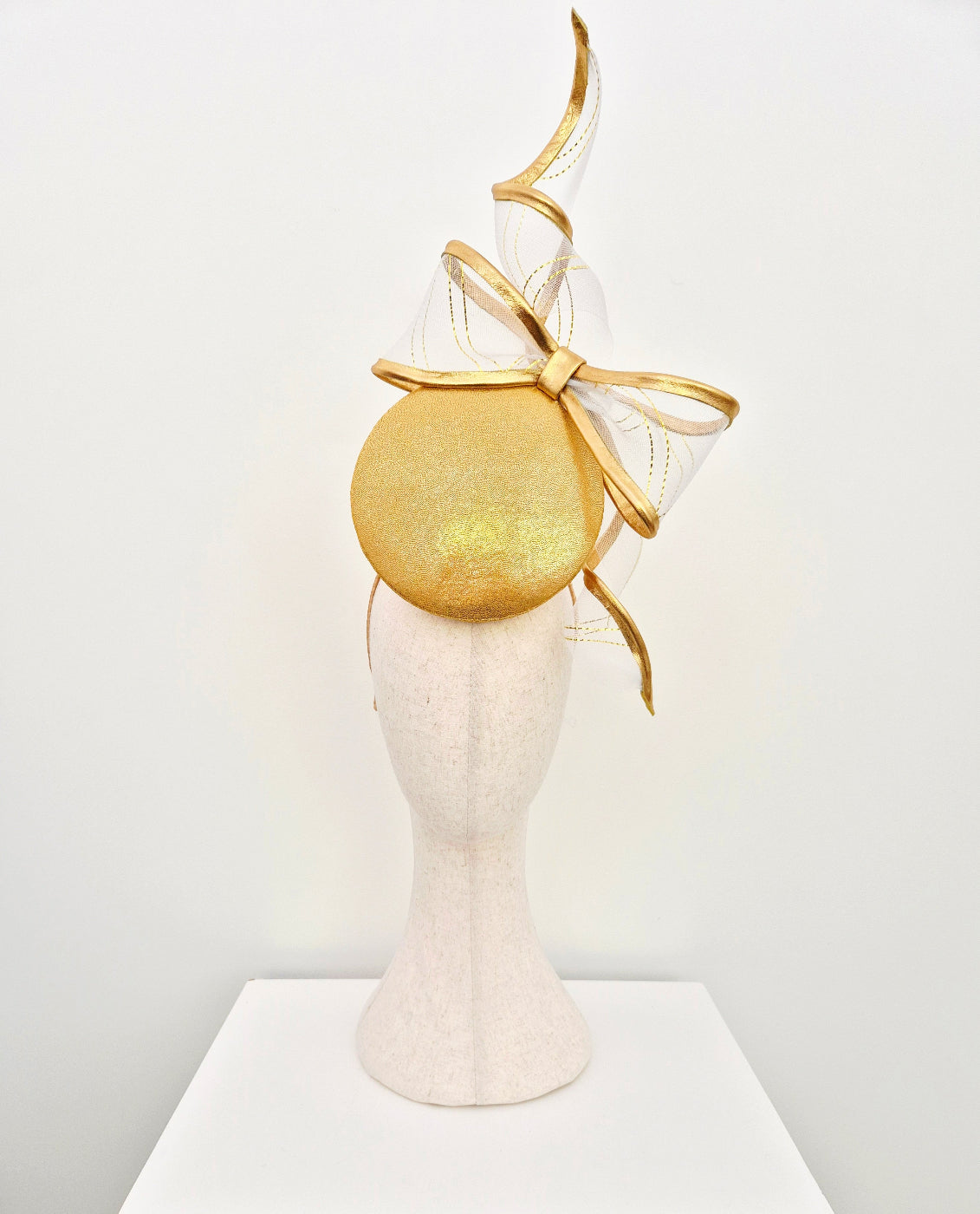 gold percher headpiece with bow