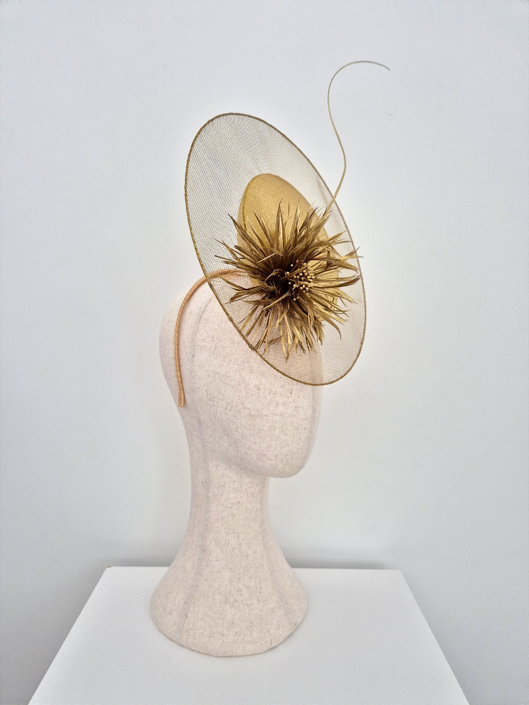 gold percher with feather flower side view