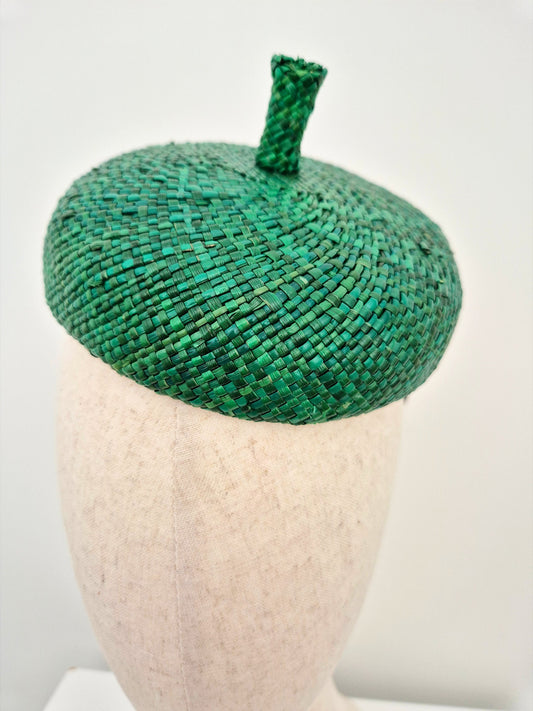 green vintage straw headpiece close up