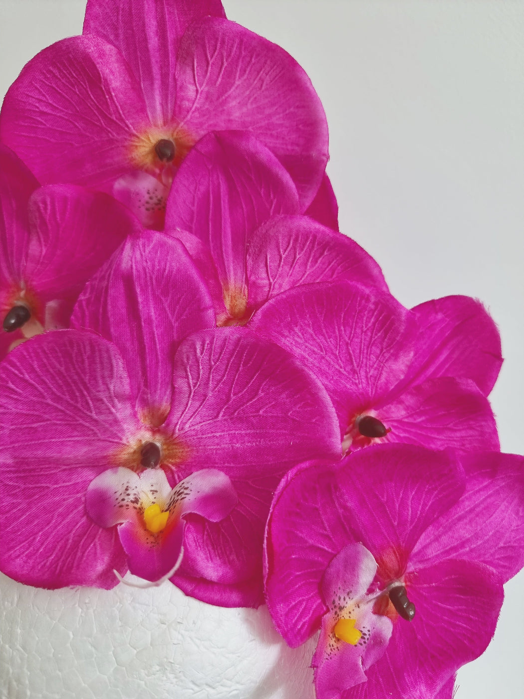 hot pink orchid headpiece close up