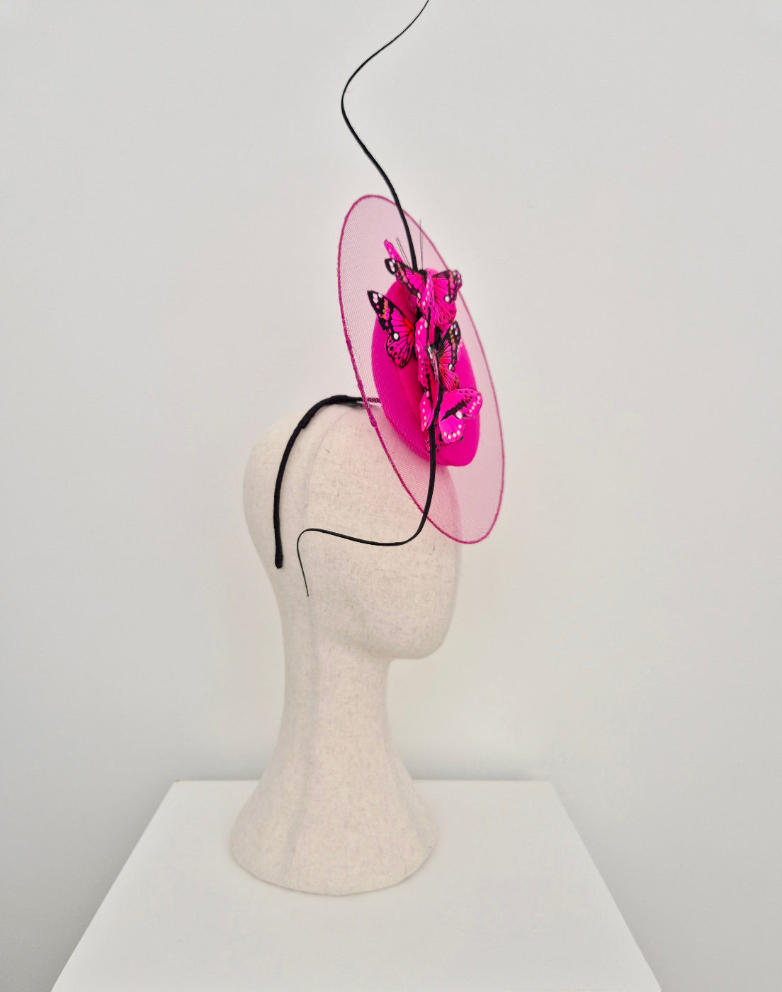 pink percher with butterflies side view