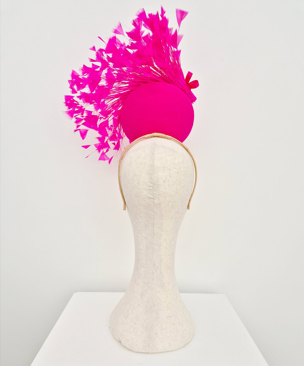 back viewhot pink percher headpiece with feathers