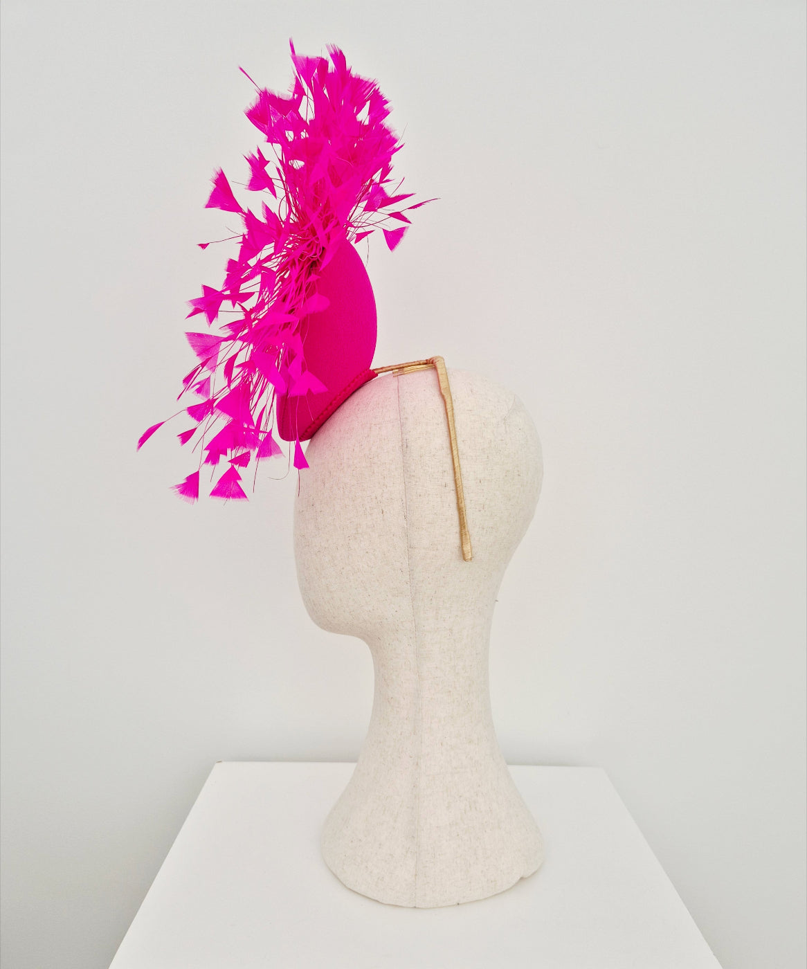 hot pink percher headpiece with feathers side view