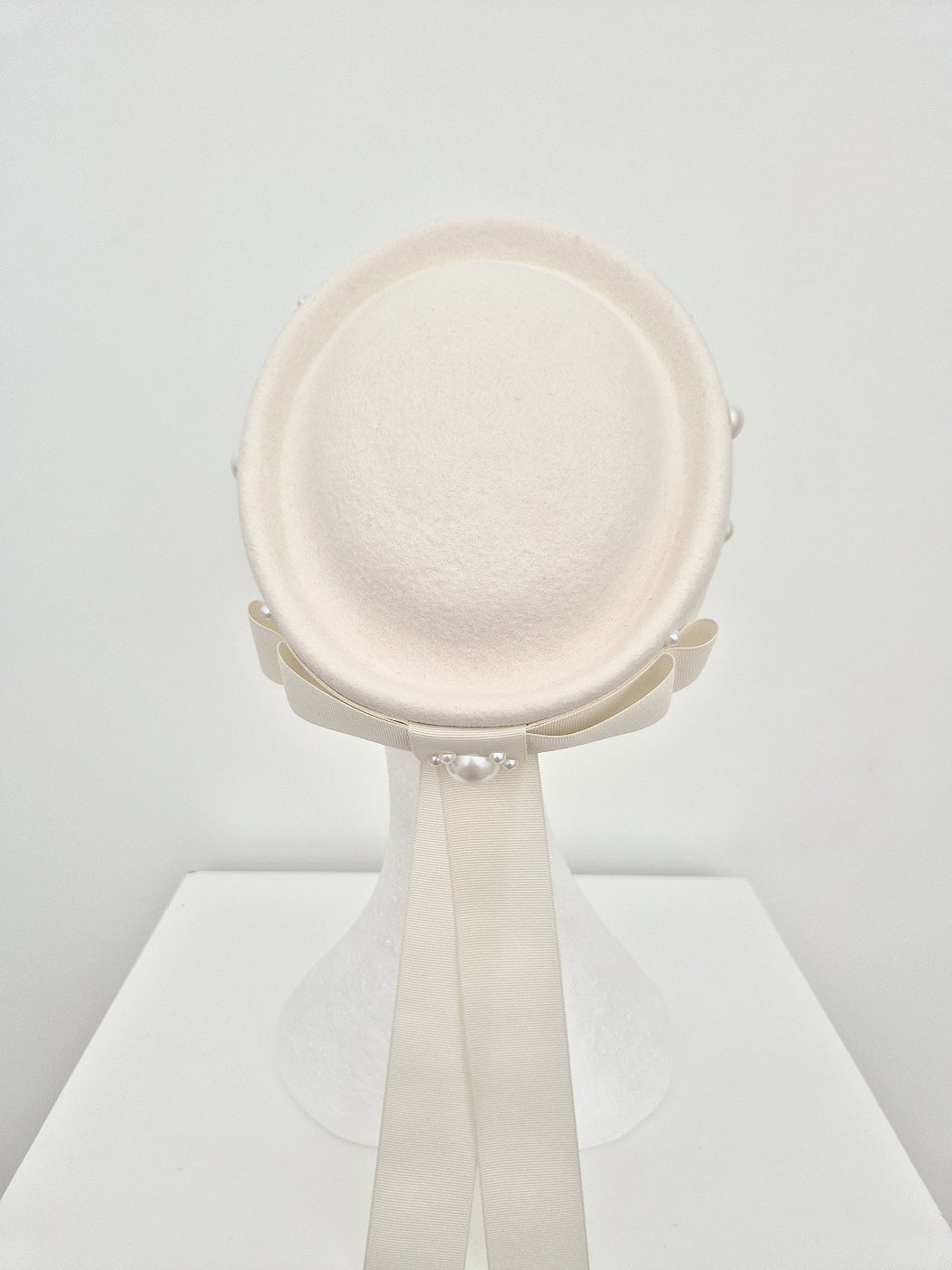 ivory felt pillbox with bow back