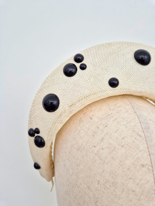 ivory straw halo headpiece with black pearls close up