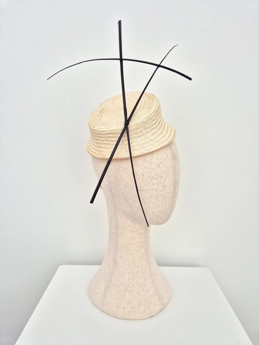 ivory straw headpiece with black quills side view