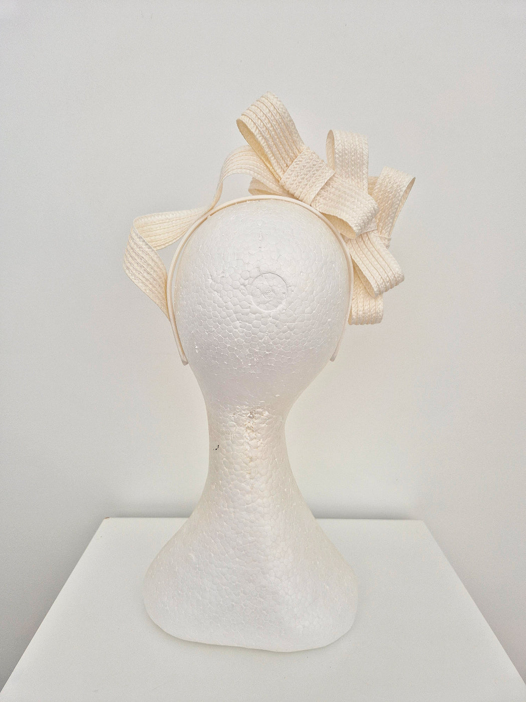 ivory straw stacked bow headpiece back view