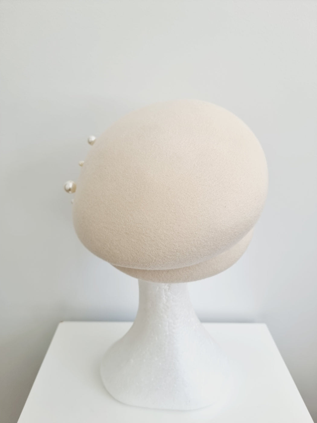 ivory wool cap with beads back
