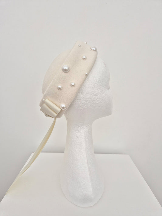 ivory felt pillbox with pearls and bow side view