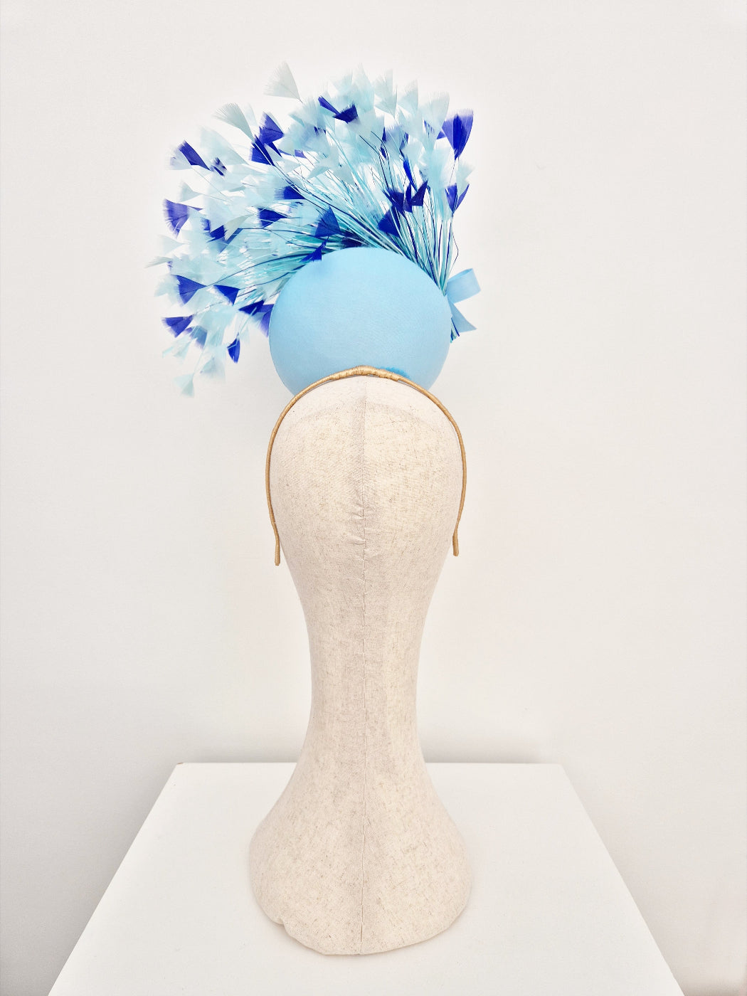 light blue percher headpiece with feathers back view