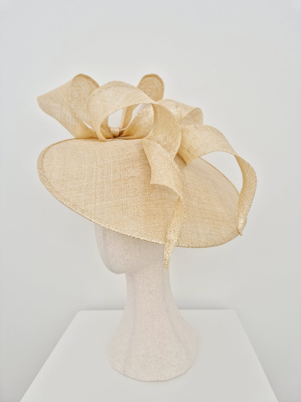 light gold straw coolie hat with bow and tails side front