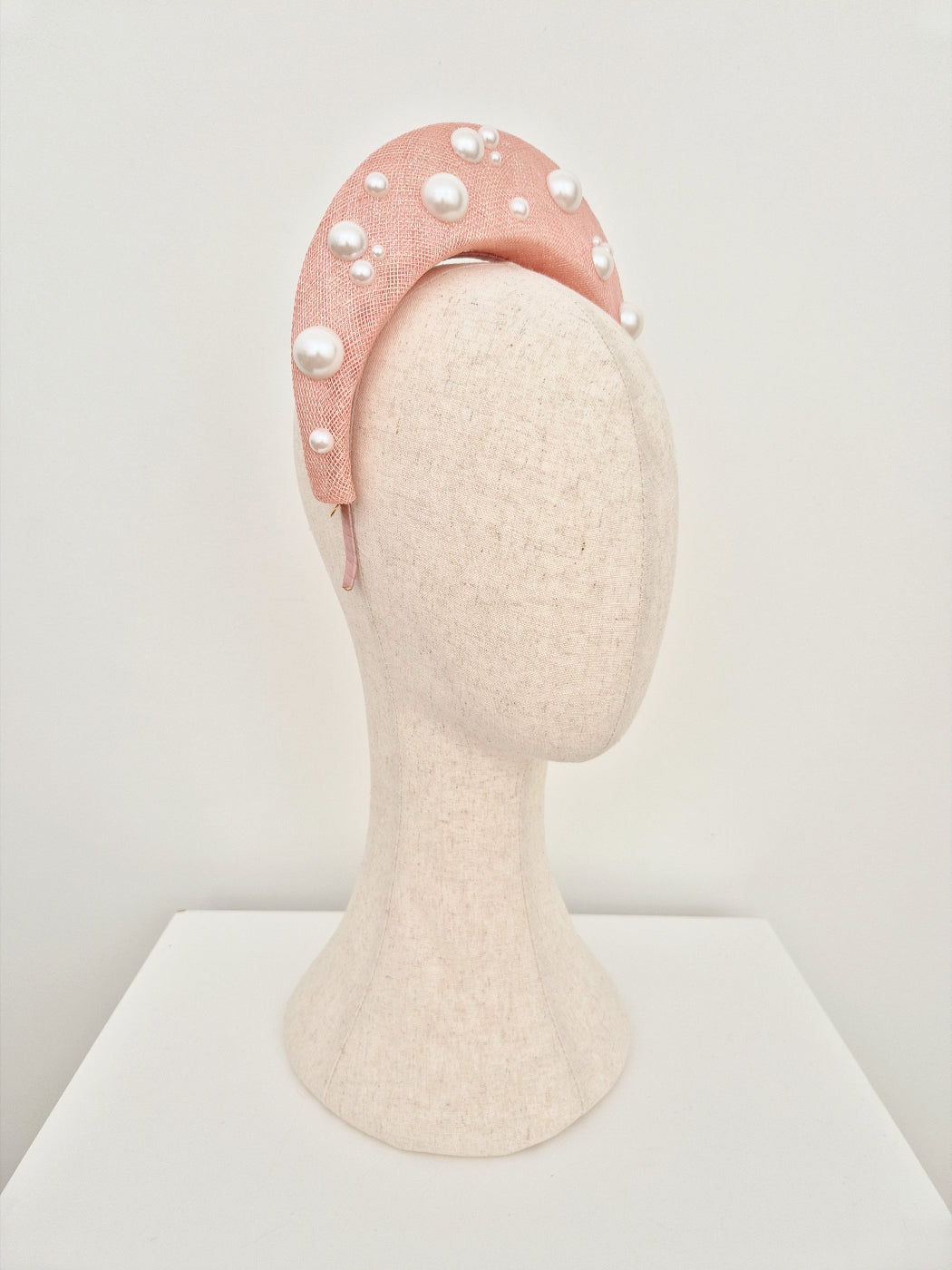 light pink straw halo headpiece with pearls side view