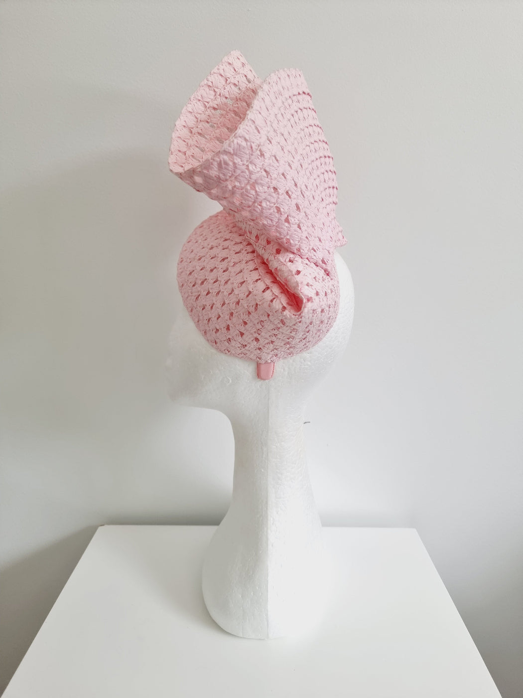 light pink straw headpiece side