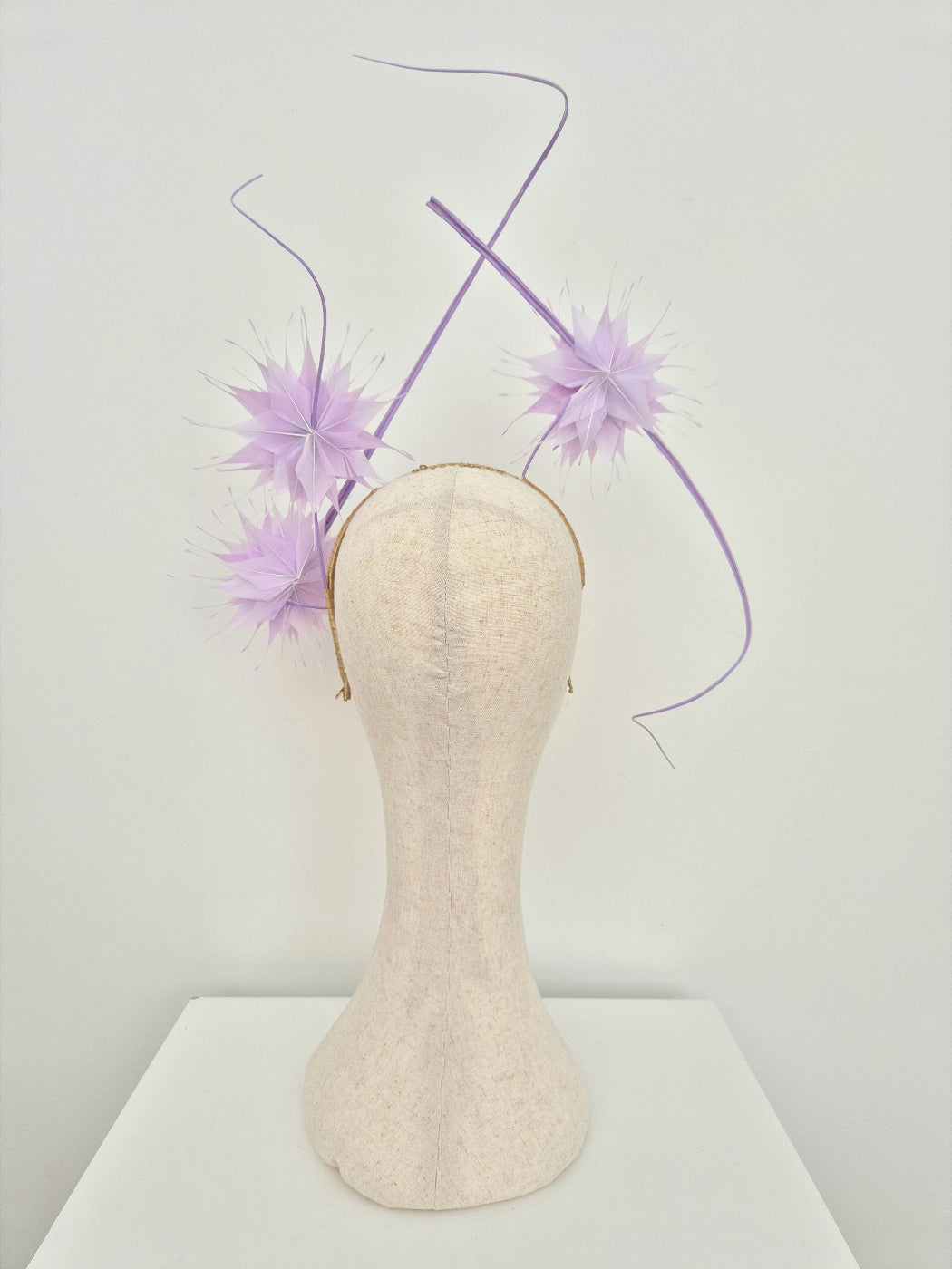 lilac feather flower headpiece back view