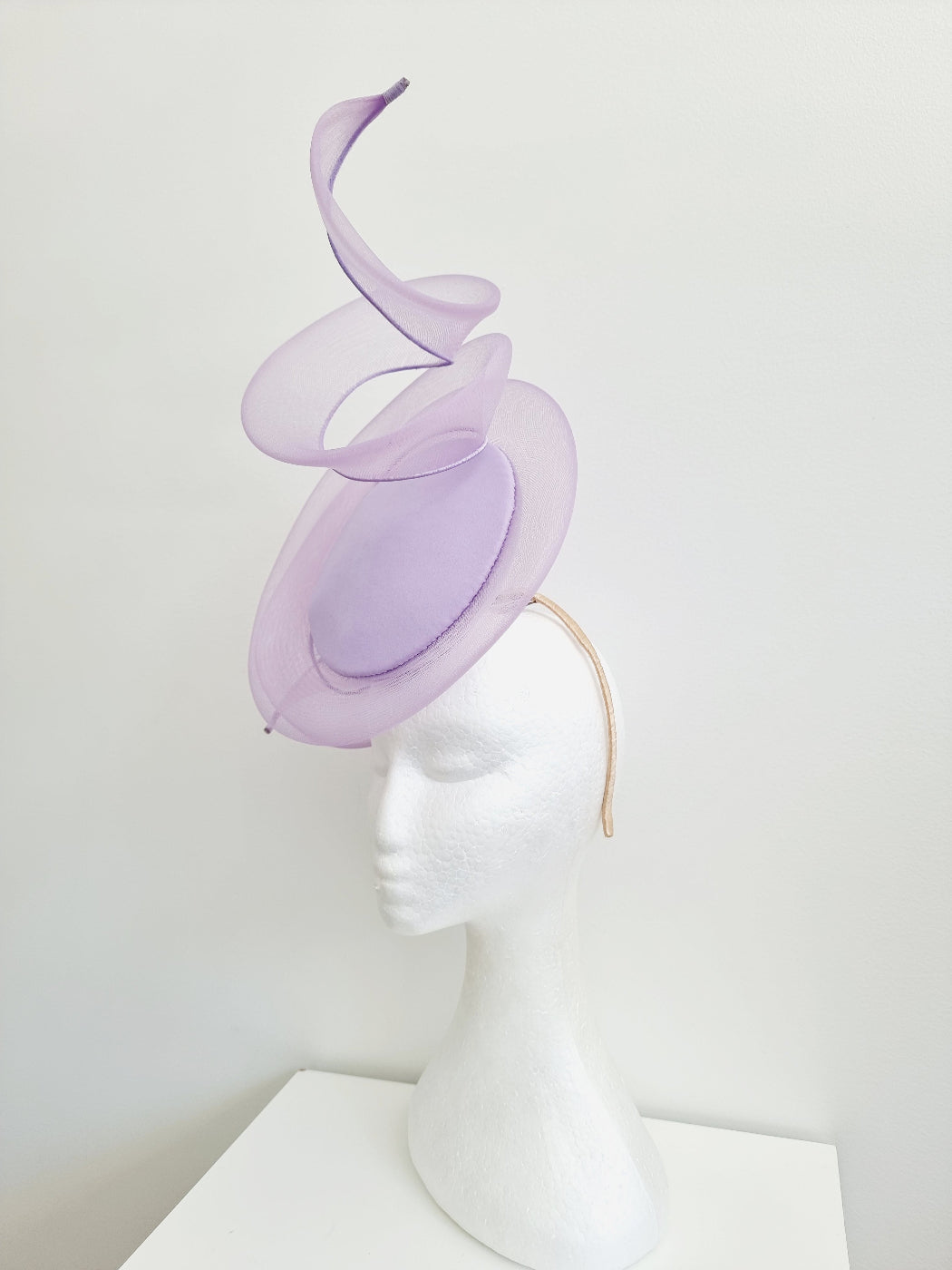 lilac percher headpiece with crinoline swirl side front