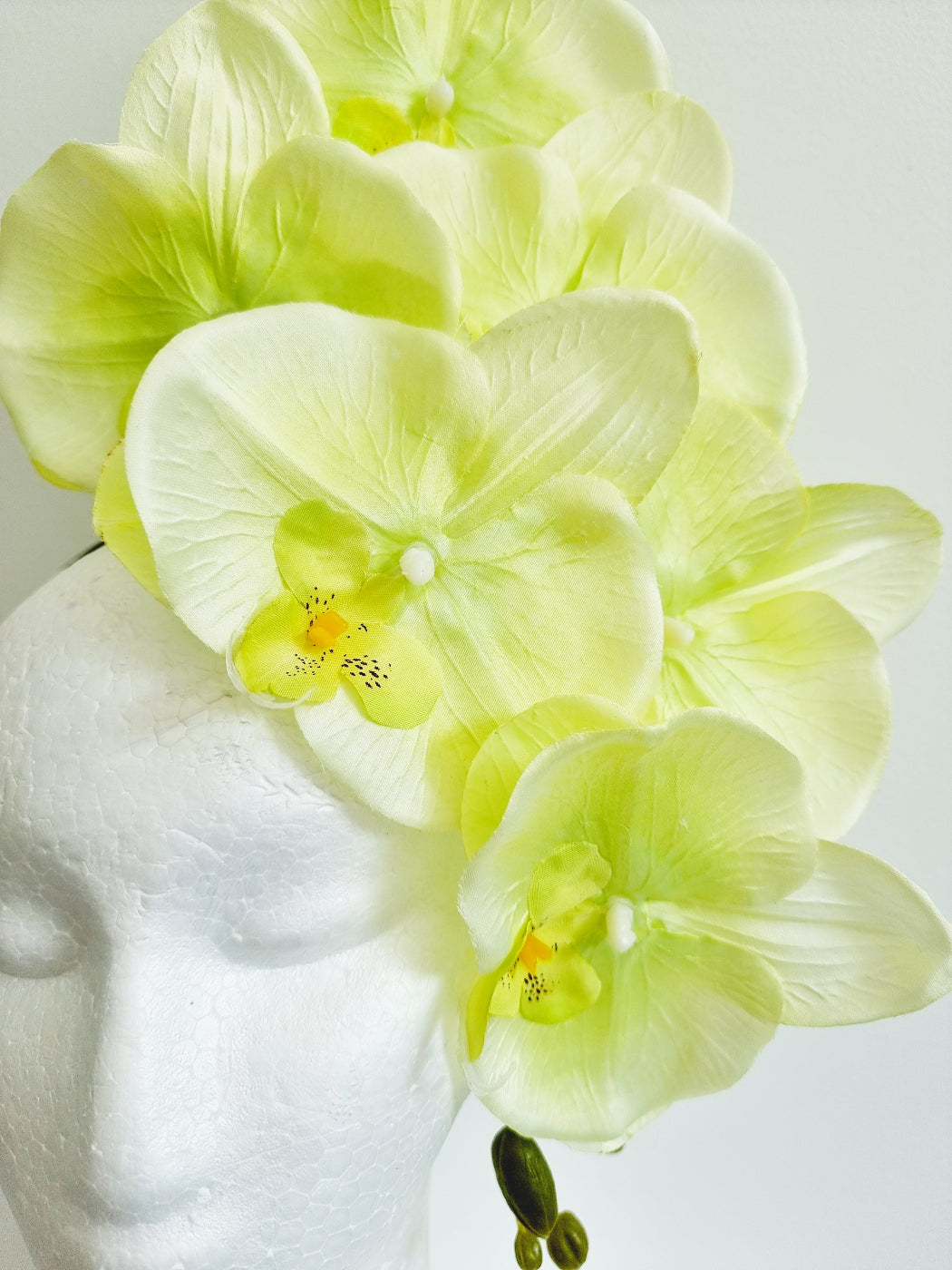 lime green orchid headpiece close up
