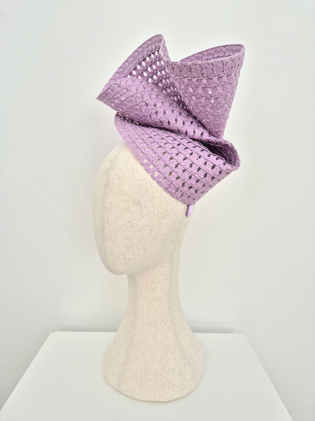 mauve straw headpiece side view