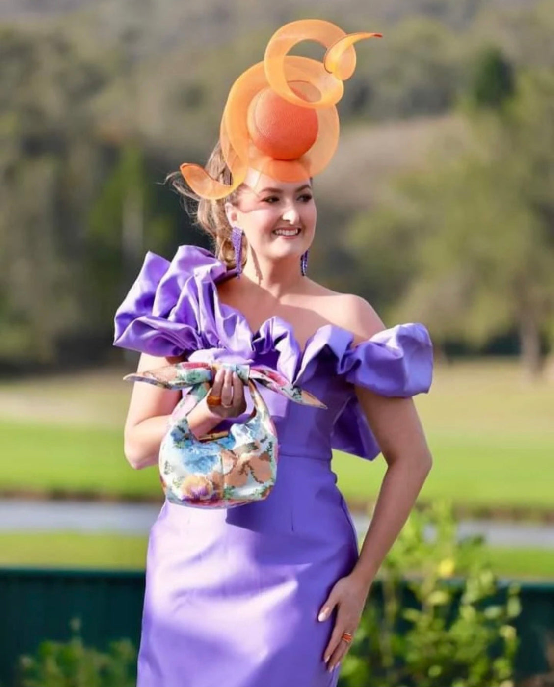 model wearing orange percher
