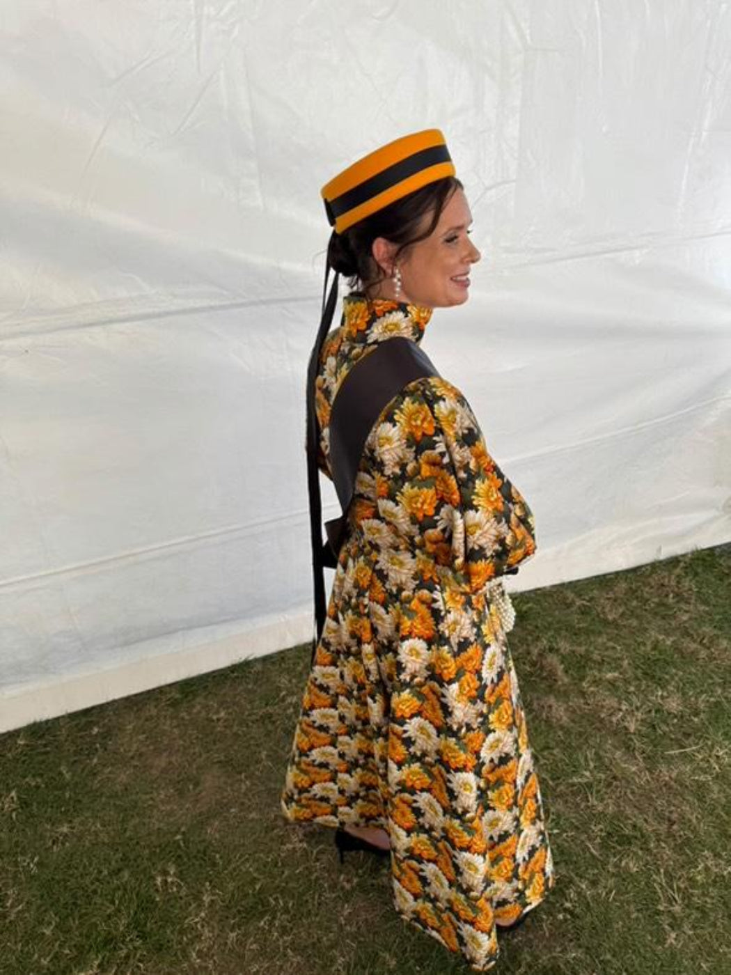 model wearing pillbox headpiece